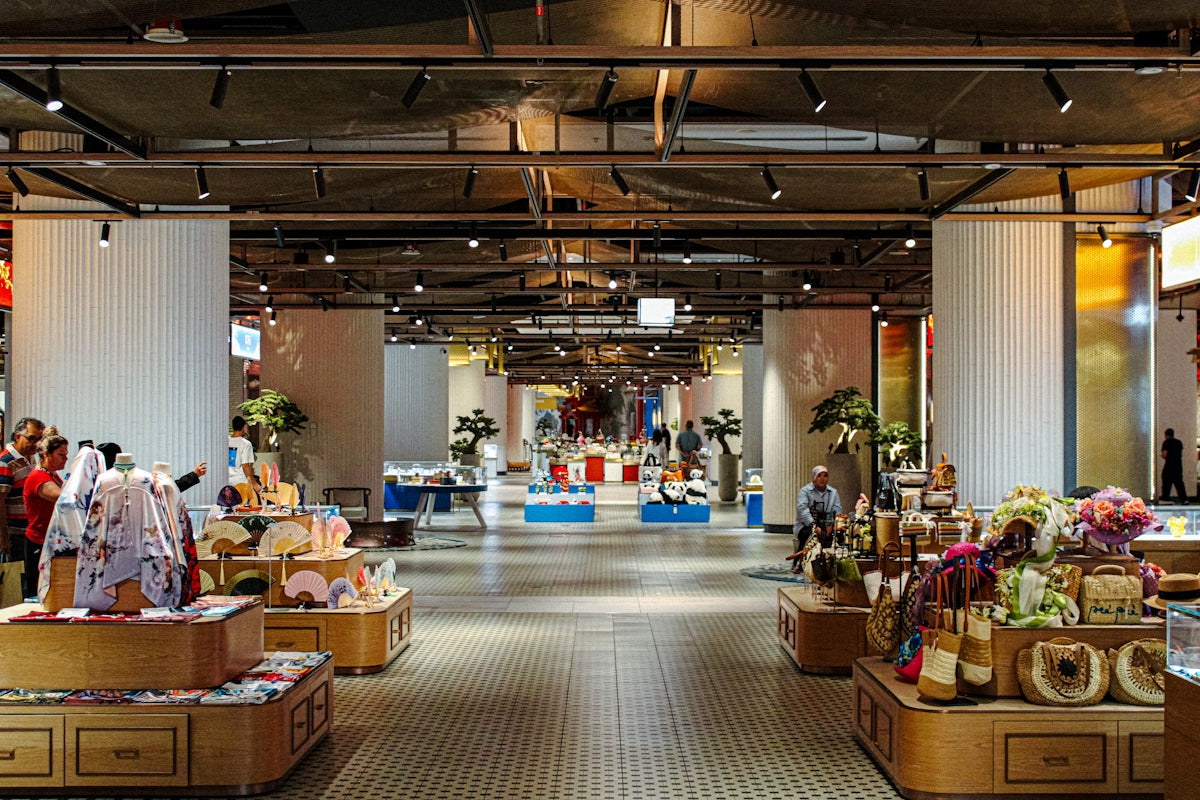 Interior view of a well-lit retail store with merchandise displays.