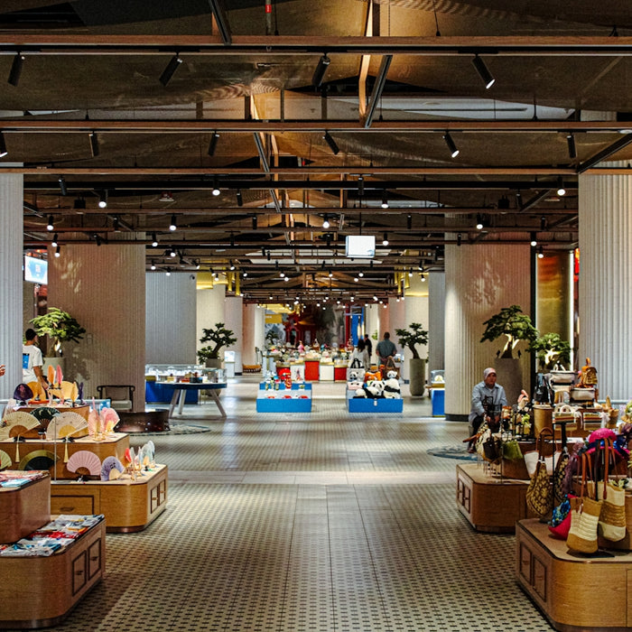 Interior view of a well-lit retail store with merchandise displays.